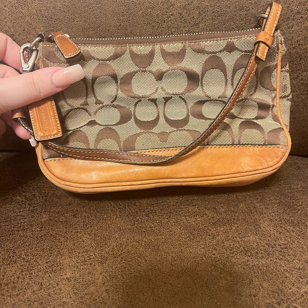 Coach Brown and Tan Signature Clutch
